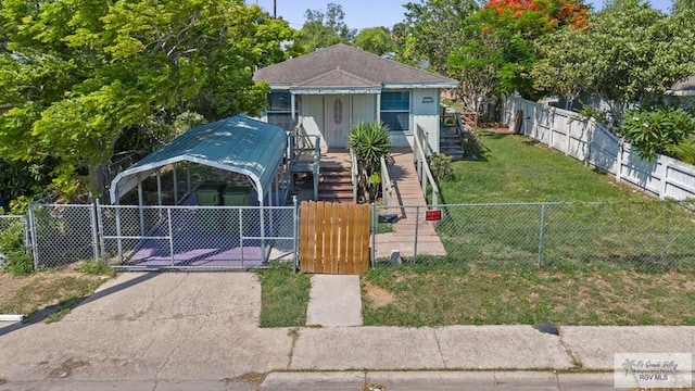 1537 E Harrison St, Brownsville, TX 78520 - view of front of house with a gate and stairway