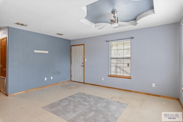 1537 E Harrison St, Brownsville, TX 78520 - empty room with ceiling fan, tile patterned floors, and baseboards