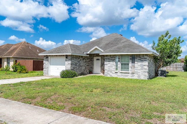 3053 Fairfield Dr, Brownsville, TX 78526 - ranch-style home with an attached garage and concrete driveway