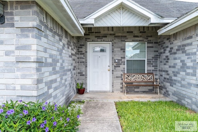 3053 Fairfield Dr, Brownsville, TX 78526 - property entrance with brick siding and a shingled roof
