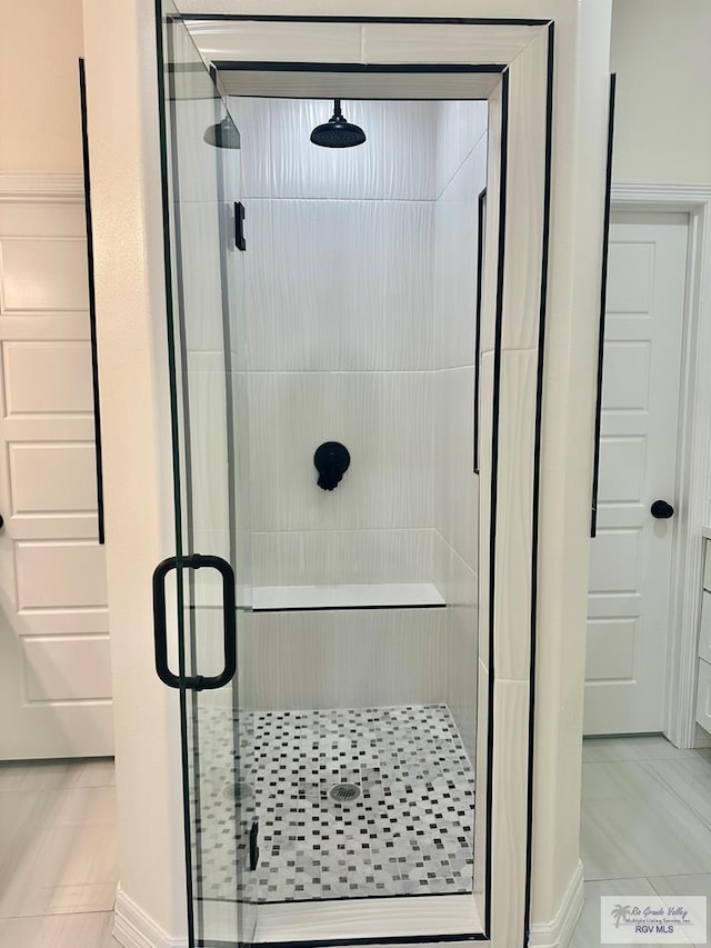 full bathroom featuring a stall shower