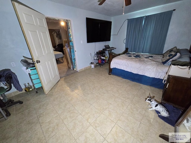 bedroom featuring ceiling fan