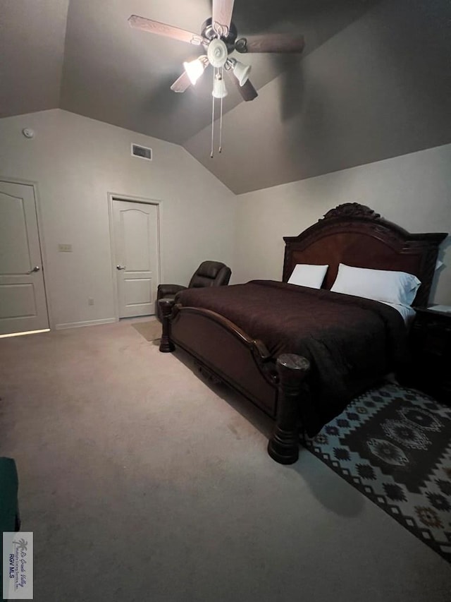 carpeted bedroom featuring baseboards, vaulted ceiling, ceiling fan, and visible vents