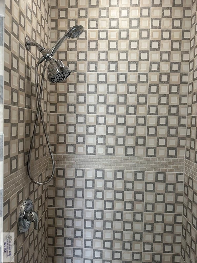 details featuring a tile shower