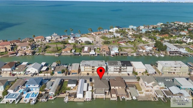 birds eye view of property featuring a water view