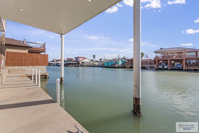 dock area with a water view