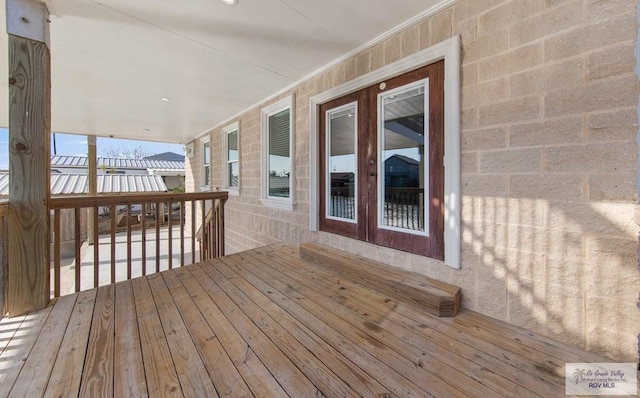 wooden deck featuring a porch