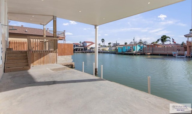 dock area with a water view