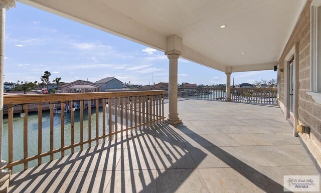 view of patio / terrace featuring a water view