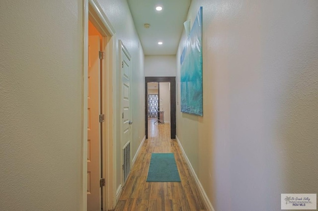 hall featuring hardwood / wood-style floors