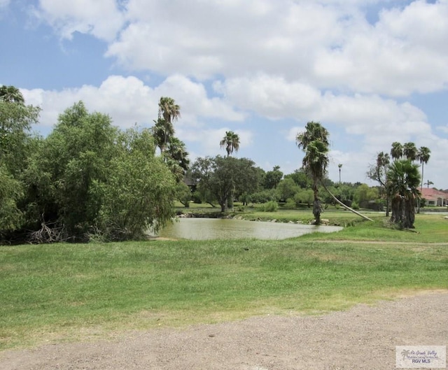 225 Country Club Rd Unit 225, Brownsville, TX 78520 - view of home's community featuring a water view and a lawn