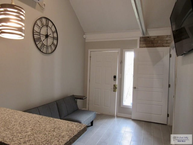 225 Country Club Rd Unit 225, Brownsville, TX 78520 - foyer with lofted ceiling and light wood-type flooring