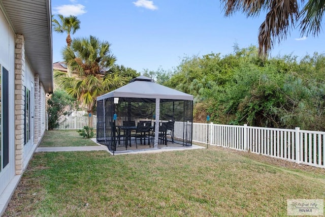 view of yard with a gazebo and a patio