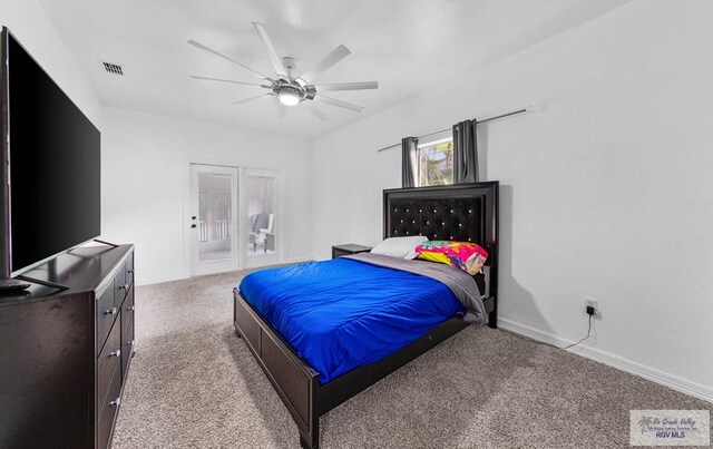 bedroom with ceiling fan and light carpet