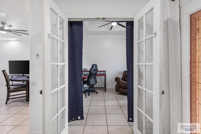 office area with french doors, light tile patterned floors, and ceiling fan