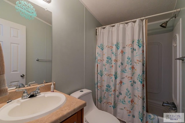 full bathroom featuring vanity, toilet, and shower / tub combo