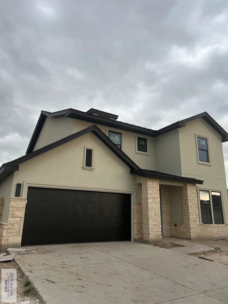 view of front of house with a garage