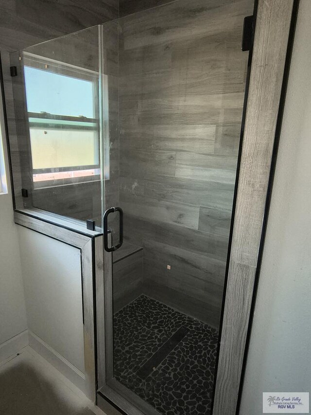 9728 Heights S Unit 9, Harlingen, TX 78552 - full bathroom with a stall shower