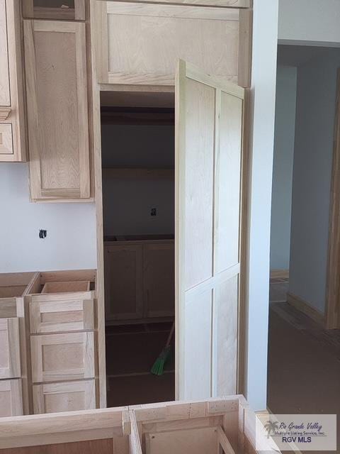 9728 Heights S Unit 9, Harlingen, TX 78552 - kitchen with baseboards
