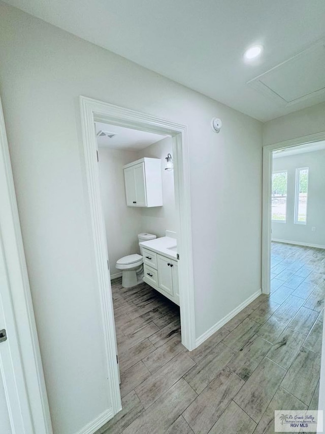 bathroom with vanity and toilet