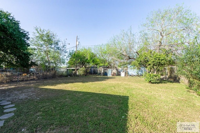 view of yard featuring a fenced backyard