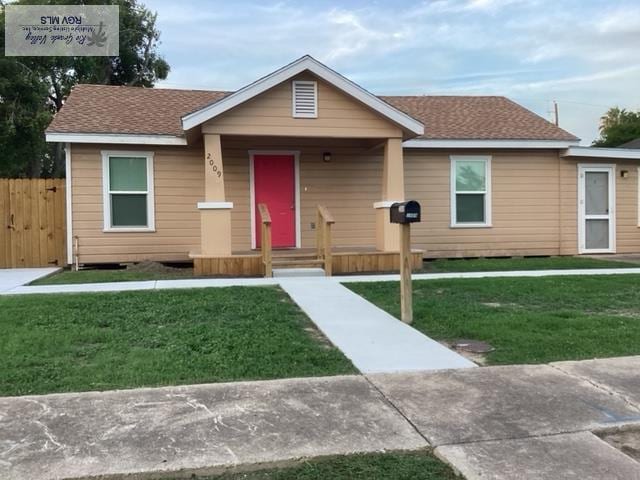 2009 Van Buren St, Brownsville, TX 78526 - ranch-style home with a shingled roof