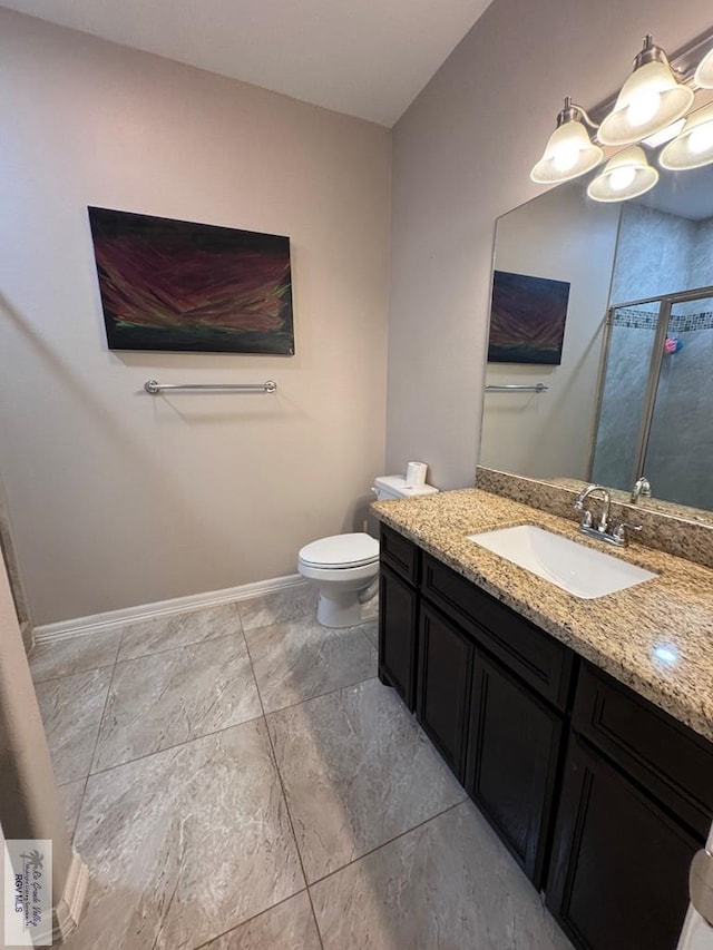 4805 N Westgate Cir, Harlingen, TX 78552 - bathroom with vanity, toilet, baseboards, a chandelier, and a shower with door