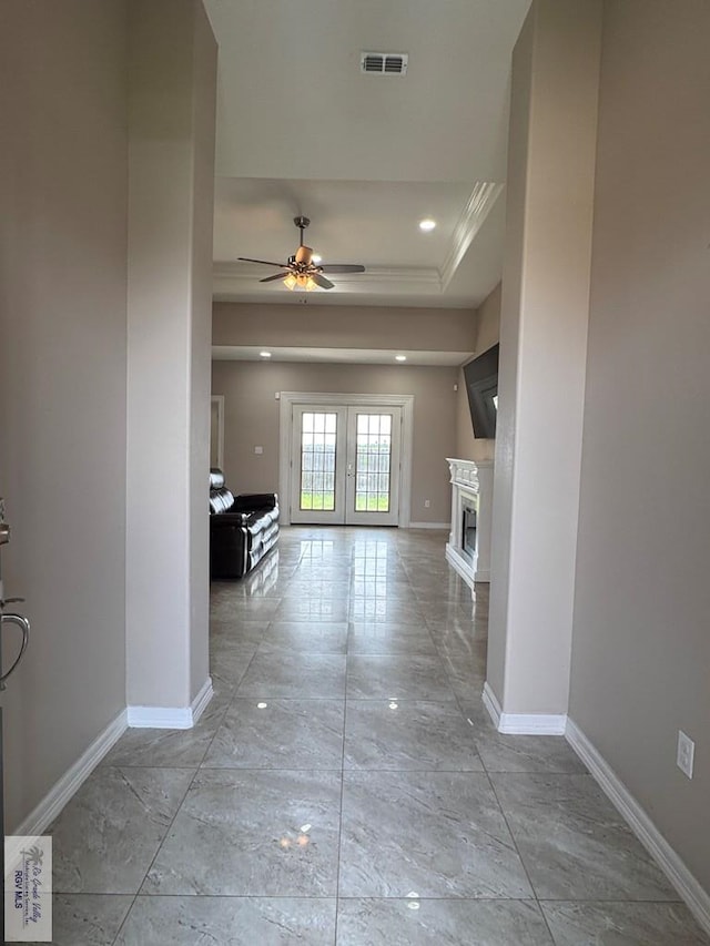 4805 N Westgate Cir, Harlingen, TX 78552 - hallway featuring baseboards, ornamental molding, and french doors