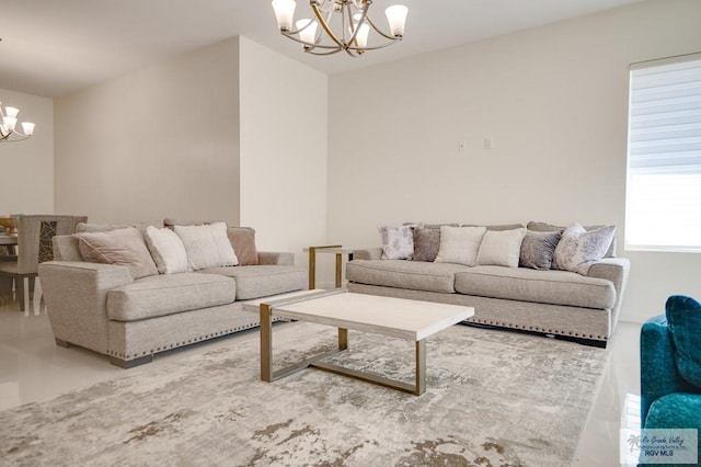 living room featuring a chandelier