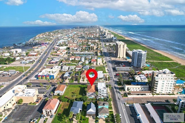 aerial view featuring a water view and a view of the beach