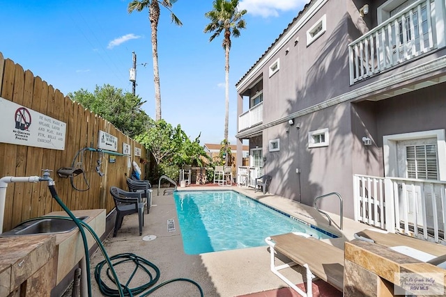 view of pool with a patio