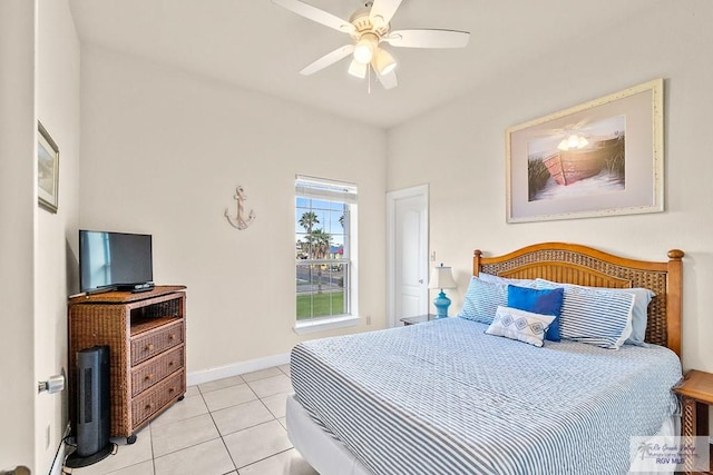 tiled bedroom with ceiling fan