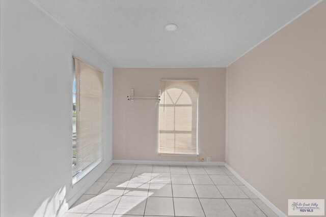 view of tiled spare room