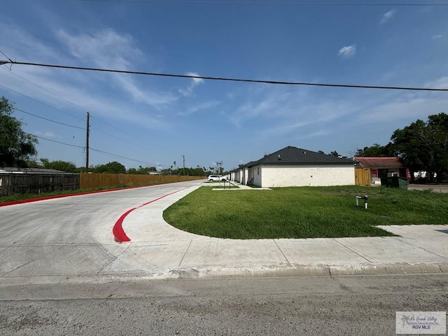 view of front of home with a front lawn