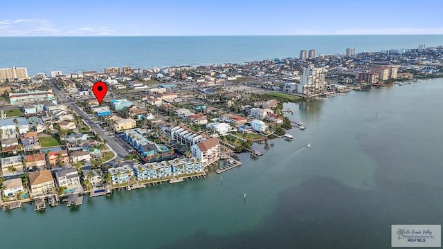 aerial view featuring a water view and a city view