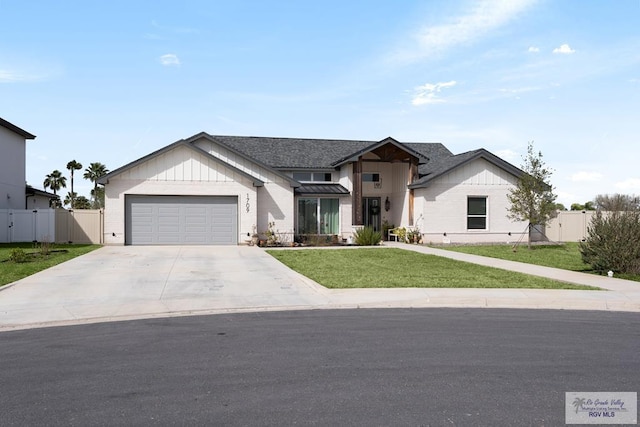 1709 Thacker Ln, Harlingen, TX 78552 - single story home with a gate, driveway, fence, a garage, and a front yard