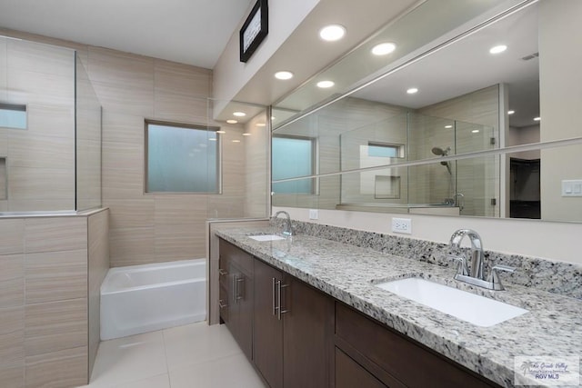 bathroom with vanity, tile patterned floors, and plus walk in shower