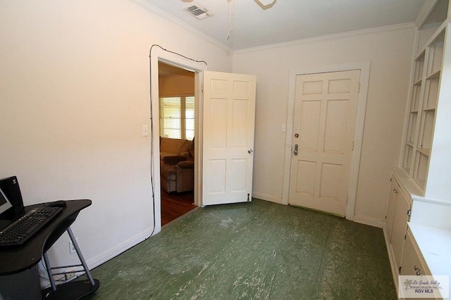 entryway with ceiling fan, ornamental molding, and baseboards
