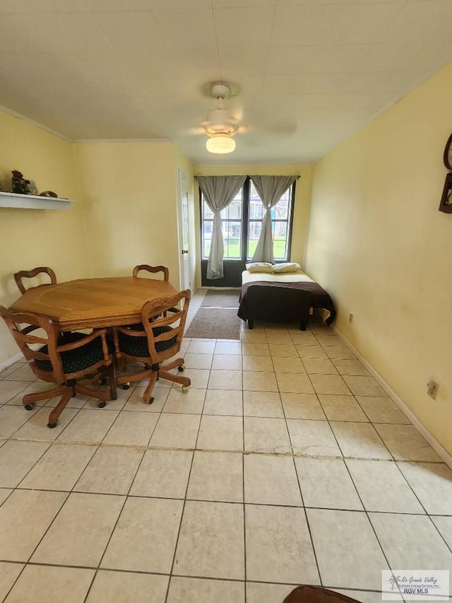 bedroom featuring ceiling fan and light tile patterned flooring