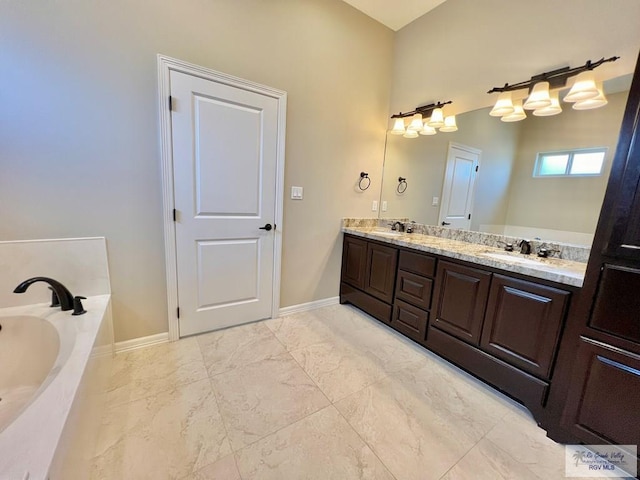 814 Knotty Pine Ln, Harlingen, TX 78552 - bathroom featuring double vanity, a bath, and marble look tiles