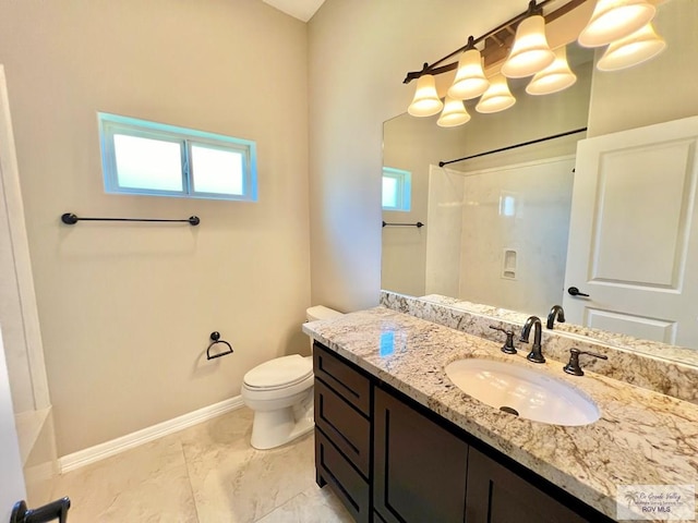 814 Knotty Pine Ln, Harlingen, TX 78552 - bathroom with vanity, healthy amount of natural light, and a shower