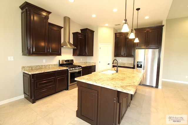 814 Knotty Pine Ln, Harlingen, TX 78552 - kitchen featuring appliances with stainless steel finishes, wall chimney exhaust hood, dark brown cabinets, light stone counters, and recessed lighting