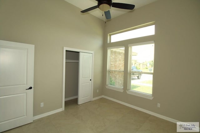 814 Knotty Pine Ln, Harlingen, TX 78552 - unfurnished bedroom with a towering ceiling and a closet