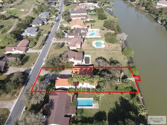 aerial view featuring a water view and a residential view