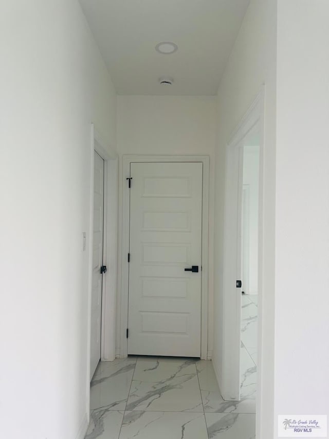1321 White Oak Dr, Harlingen, TX 78522 - hall featuring light marble finish floors