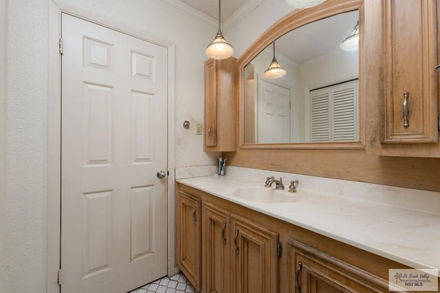 bathroom featuring vanity and crown molding