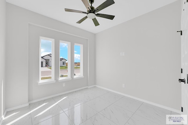 unfurnished room featuring ceiling fan