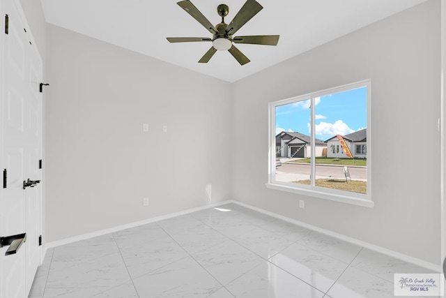 unfurnished room with ceiling fan