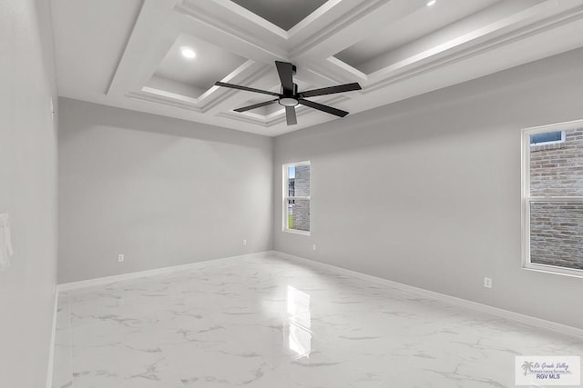 empty room with ceiling fan, beamed ceiling, and coffered ceiling