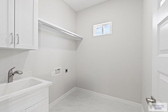 laundry room with sink, hookup for a washing machine, cabinets, and hookup for an electric dryer